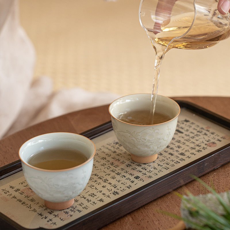 Grey Ceramic Teacup in Persimmon Shape with Carved Flowers and GrassTeacupsAnyee TeaGrey Ceramic Teacup in Persimmon Shape with Carved Flowers and Grass