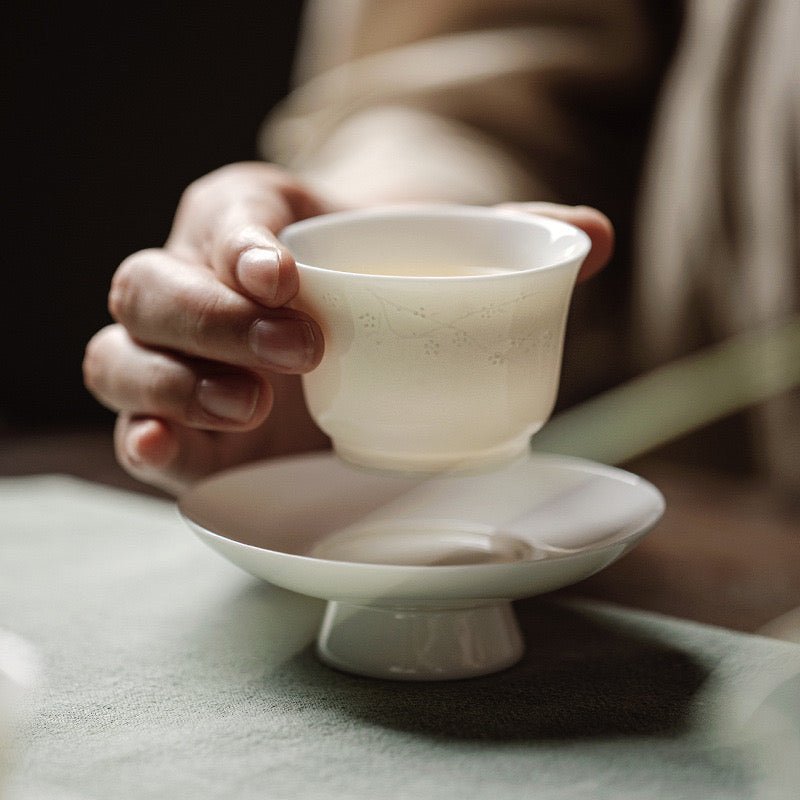 Handmade Relief Tea Cup of White Porcelain like Suet Jade with CoasterTeacupsAnyee TeaHandmade Relief Tea Cup of White Porcelain like Suet Jade with CoasterPlum