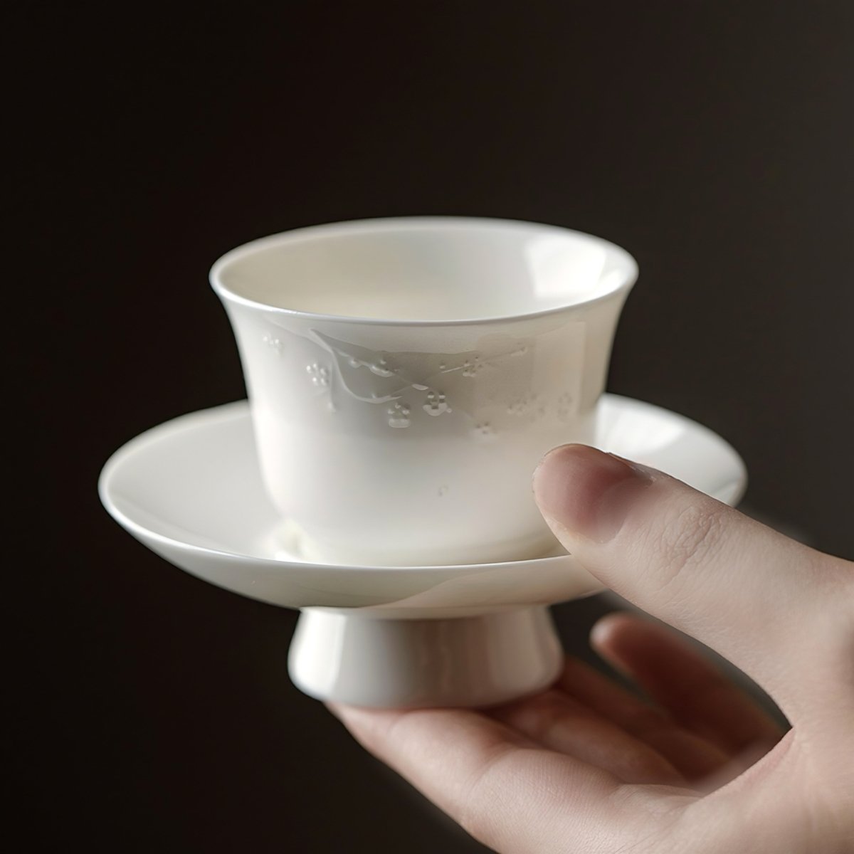 Handmade Relief Tea Cup of White Porcelain like Suet Jade with CoasterTeacupsAnyee TeaHandmade Relief Tea Cup of White Porcelain like Suet Jade with CoasterPlum