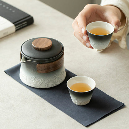 Wave pattern tea set with one pot and two cups