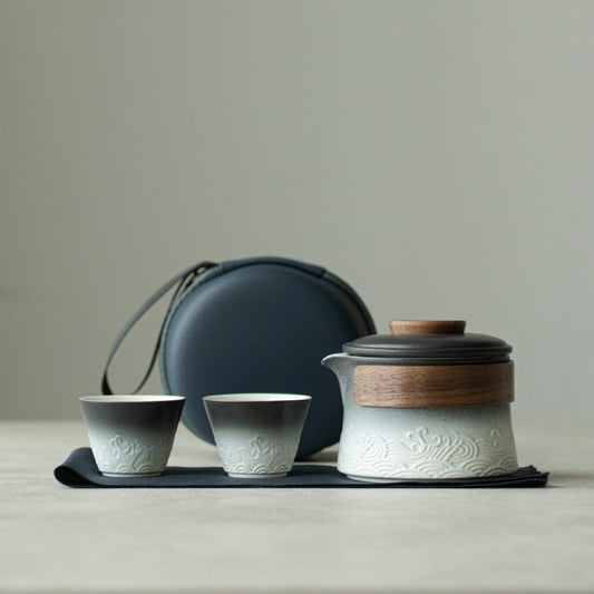 Wave pattern tea set with one pot and two cups