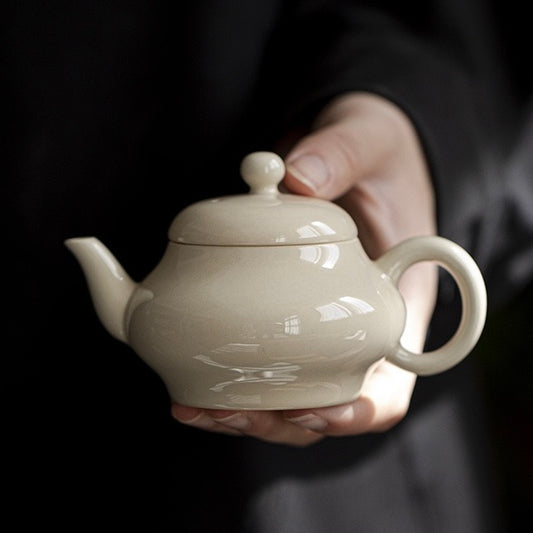 Original earth-colored ceramic teapot